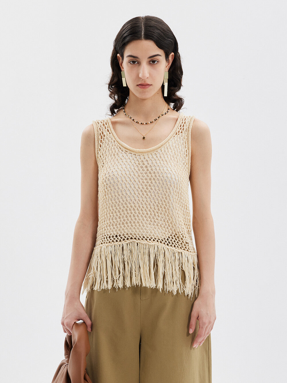Bohemian Elegance: Creamy Sleeveless Tassel Top & Green Pants Set