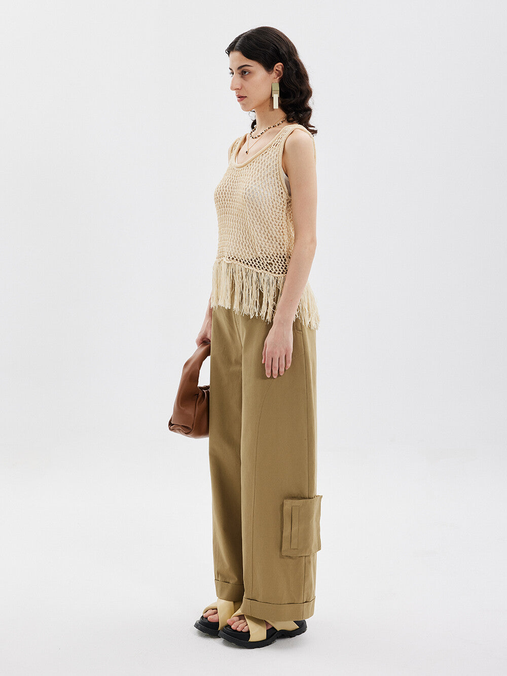 Bohemian Elegance: Creamy Sleeveless Tassel Top & Green Pants Set