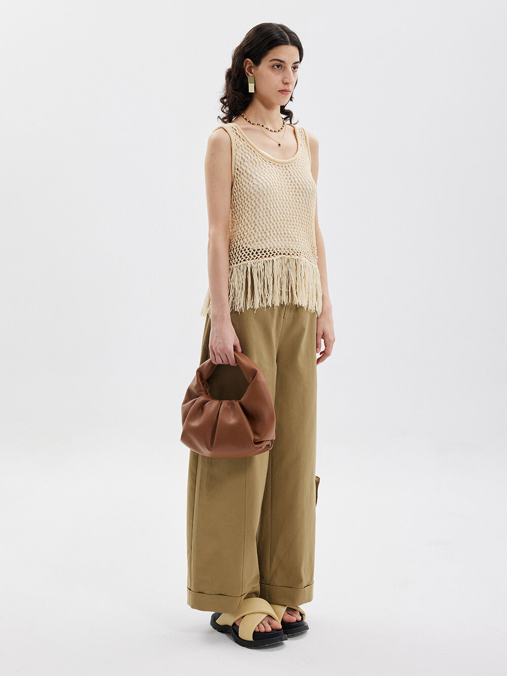 Bohemian Elegance: Creamy Sleeveless Tassel Top & Green Pants Set